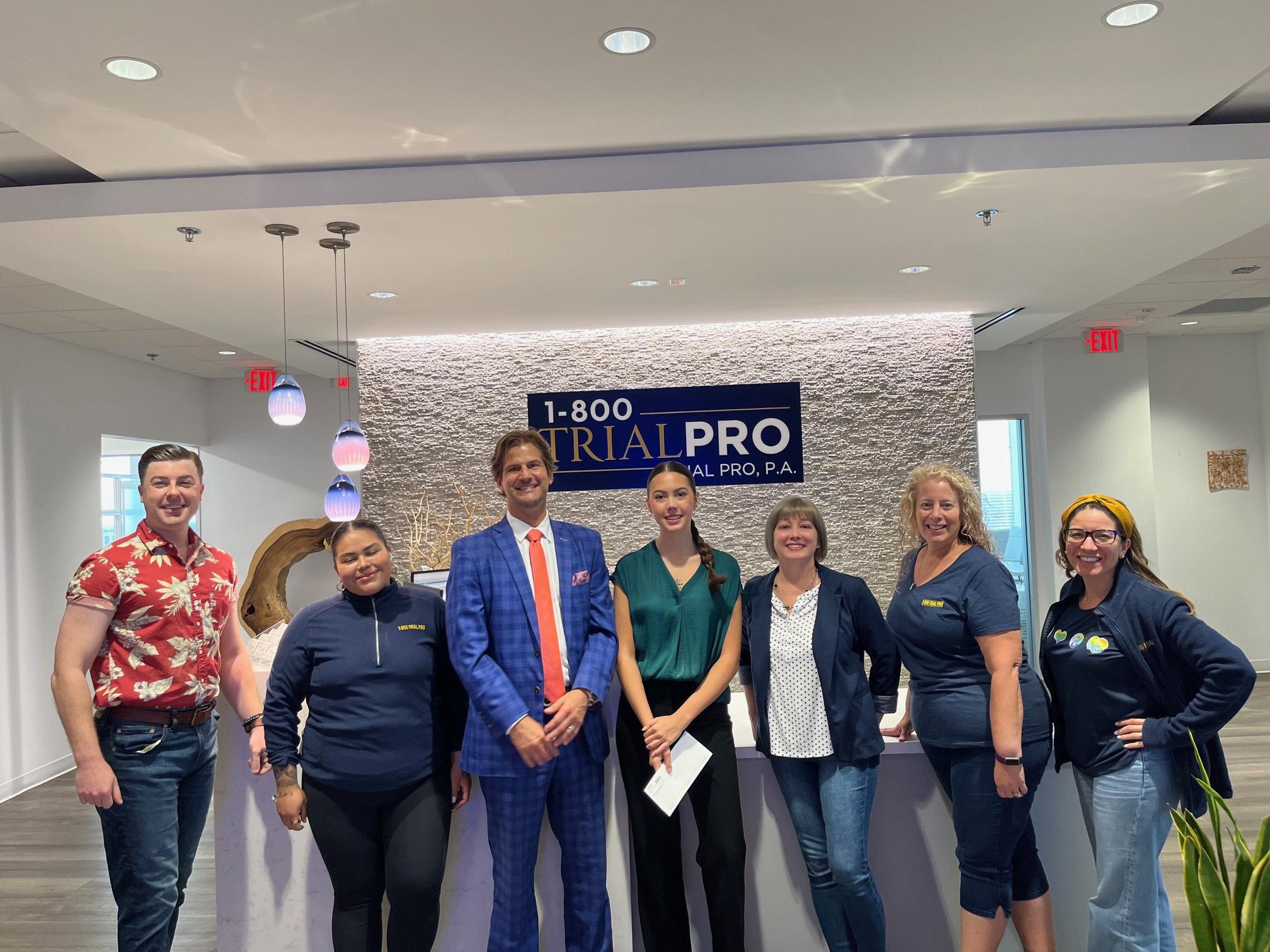 Trial Pro scholarship recipient with the Trial Pro team at the Orlando office.